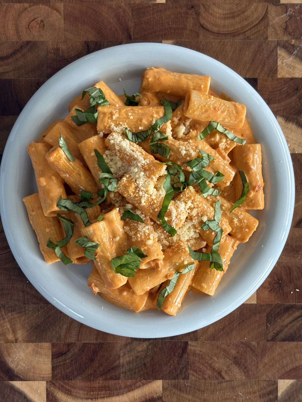 Creamy vodka pasta with fresh basil and parmesan